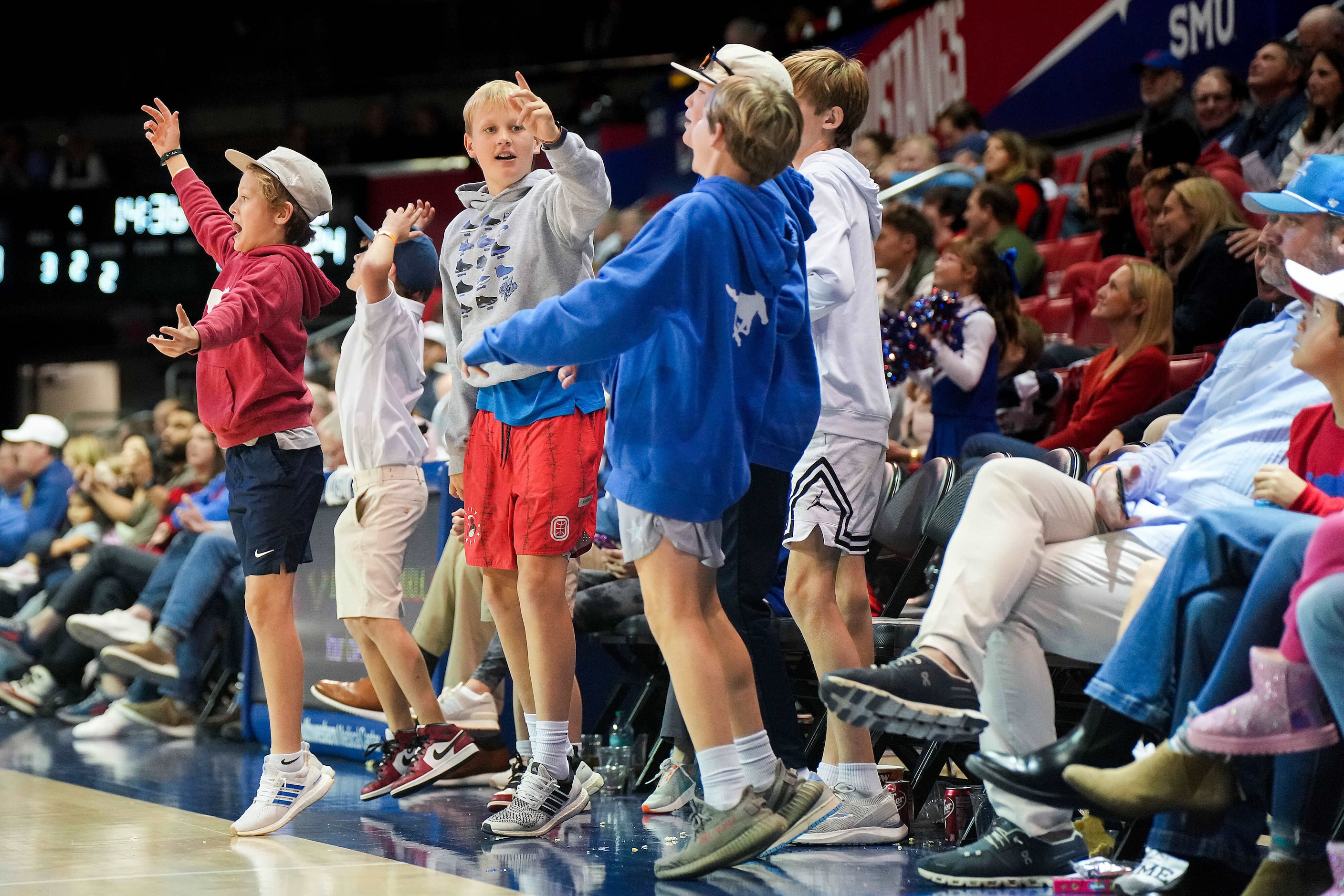 SMU fans cheer during a timeout in the second half of an NCAA men’s basketball game against...