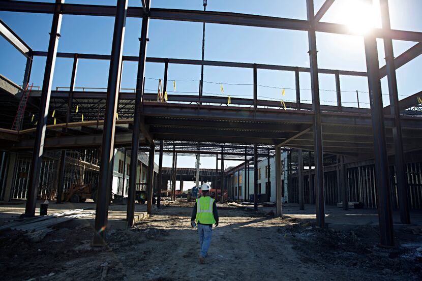 A worker enters the construction site of Memorial High School Tuesday, October 11, 2016 in...