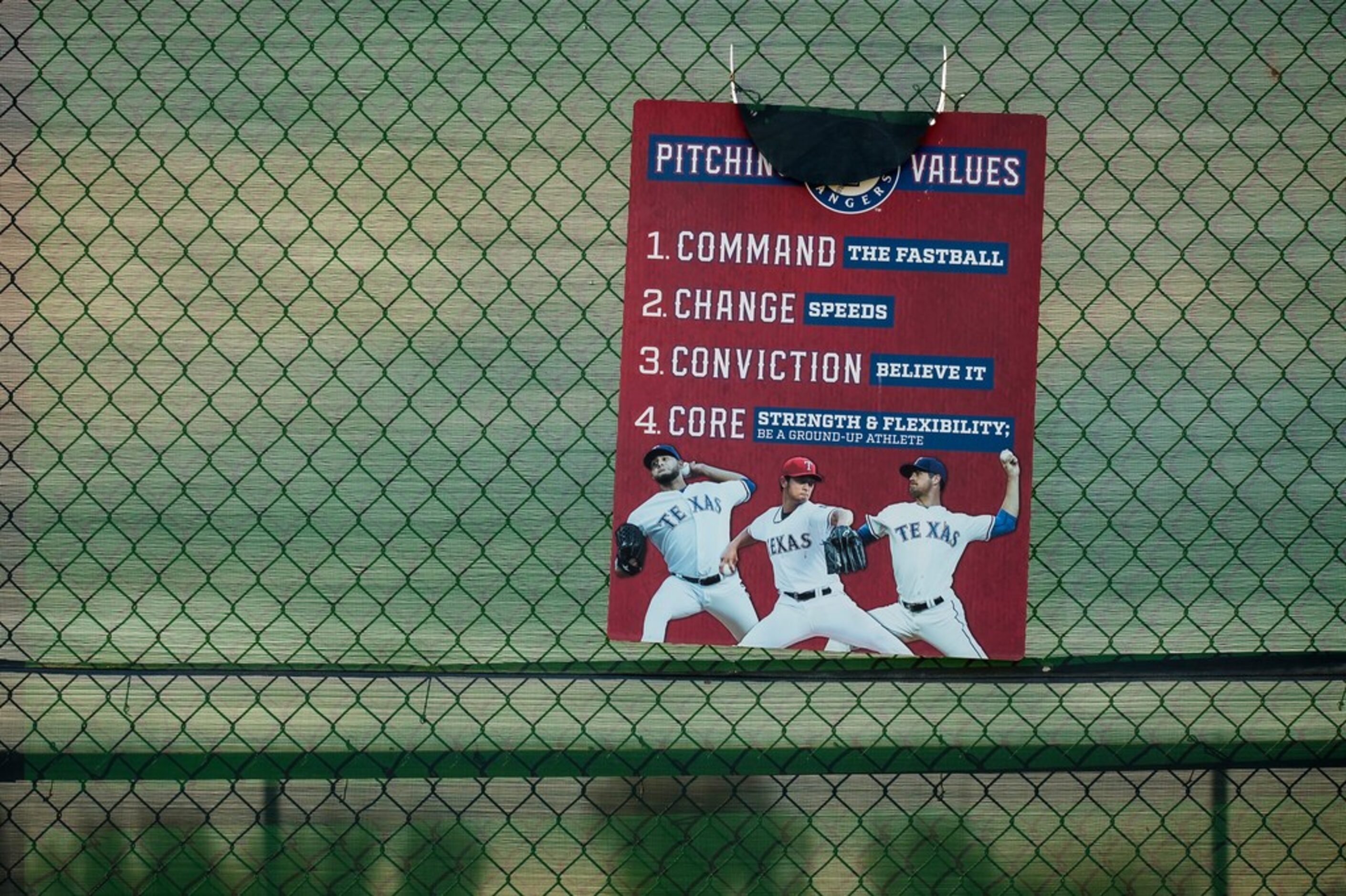 Signs in a bullpen tout Texas Rangers pitching values on the day Texas Rangers pitchers and...