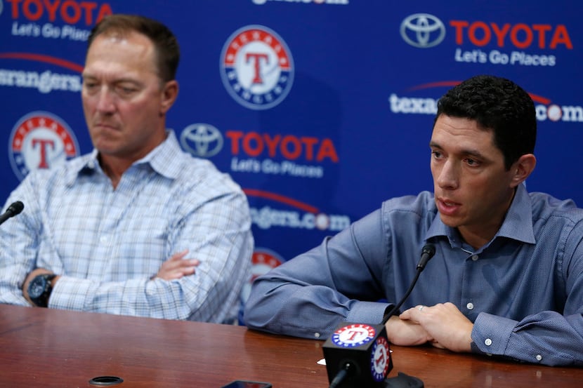 Texas Rangers President of Baseball Operations and General Manager Jon Daniels (right)...