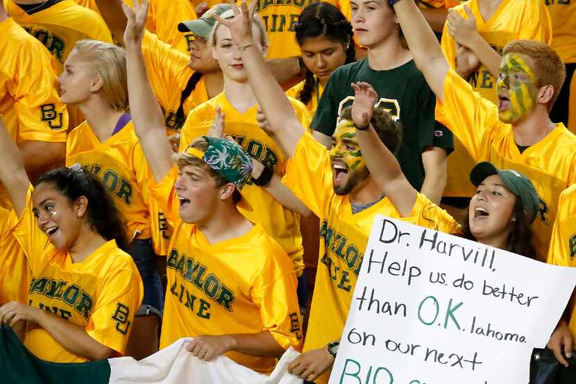 Baylor fans cheer for their team against Oklahoma State during the first quarter at McLane...