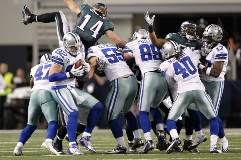Dallas Cowboys tight end Jason Witten (82) catches the onside kick attempt from the...