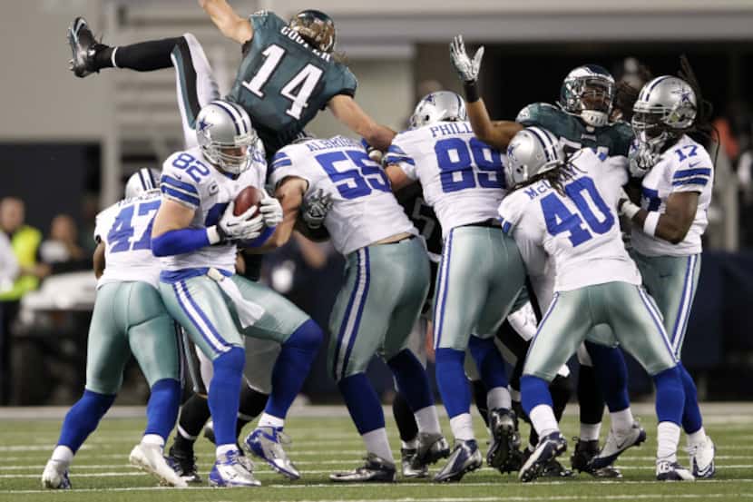 Dallas Cowboys tight end Jason Witten (82) catches the onside kick attempt from the...