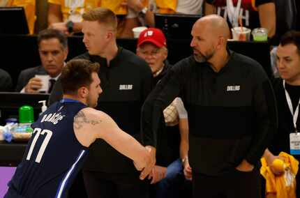Dallas Mavericks head coach Jason Kidd (right) hasn't hesitated to push Luka Doncic on such...