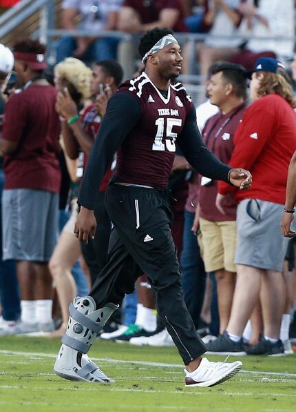 COLLEGE STATION, TX - OCTOBER 29:  Myles Garrett #15 of the Texas A&M Aggies walks onto the...