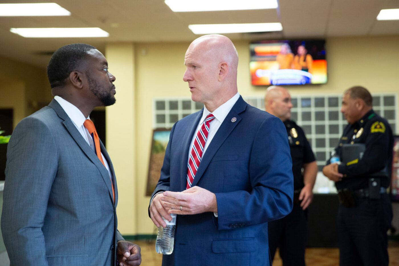 South Dallas resident Daniel Davis Clayton (left) visited with Jeoff Williams, regional...