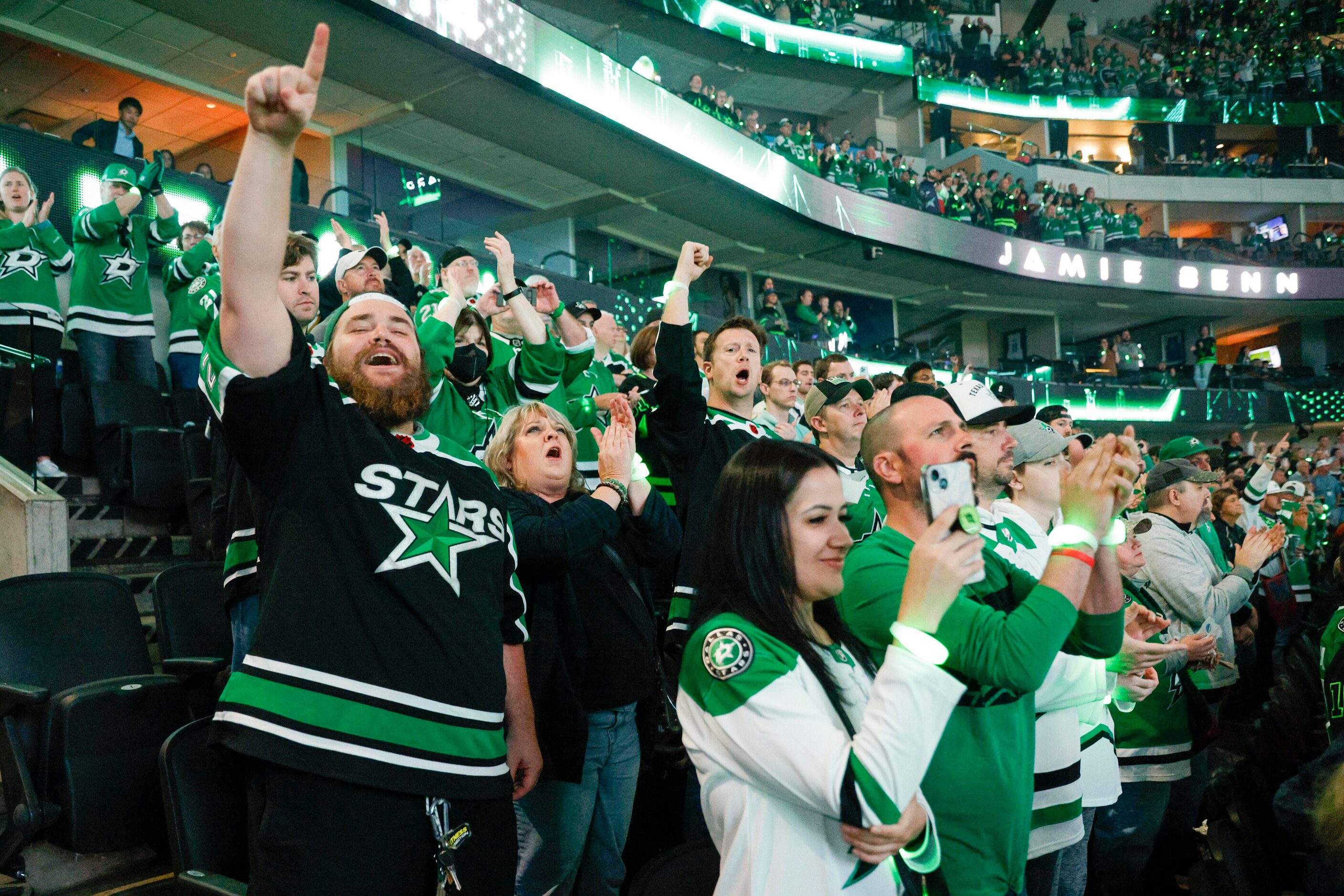 \Dallas Stars fans cheer during player introductions before the first period of the season...