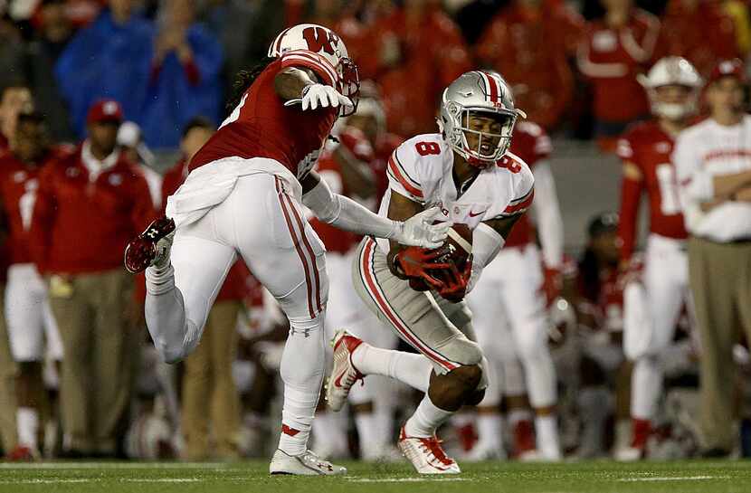 MADISON, WI - OCTOBER 15: Gareon Conley #8 of the Ohio State Buckeyes makes an interception...