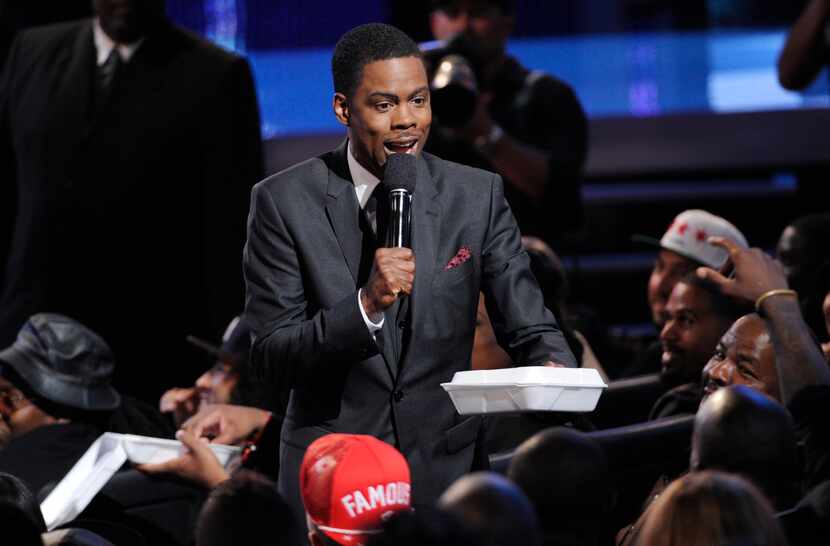 Host Chris Rock hands out fried chicken and waffles at the BET Awards at the Nokia Theatre...