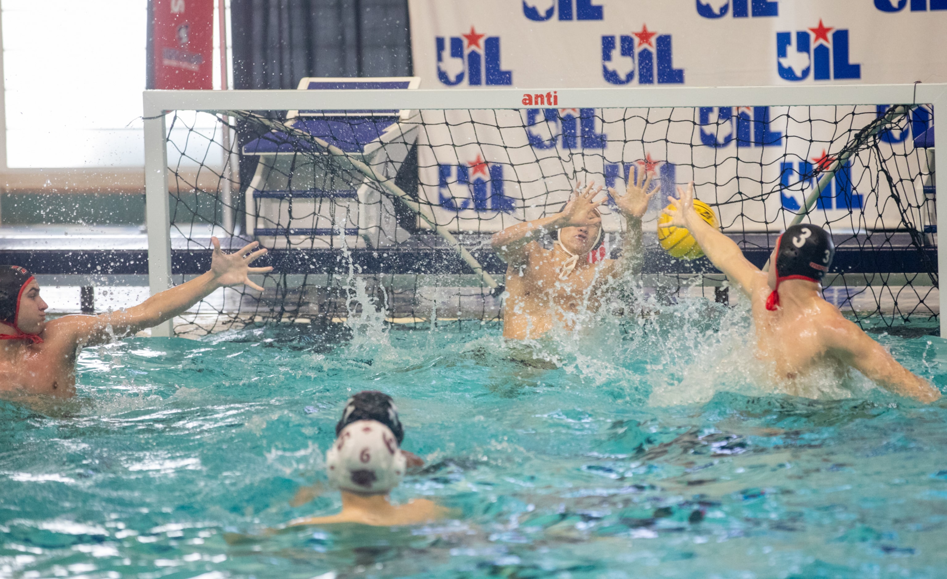 Several Flower Mound Marcus Marauders fail to block a shot from the Clear Creek Wildcats...