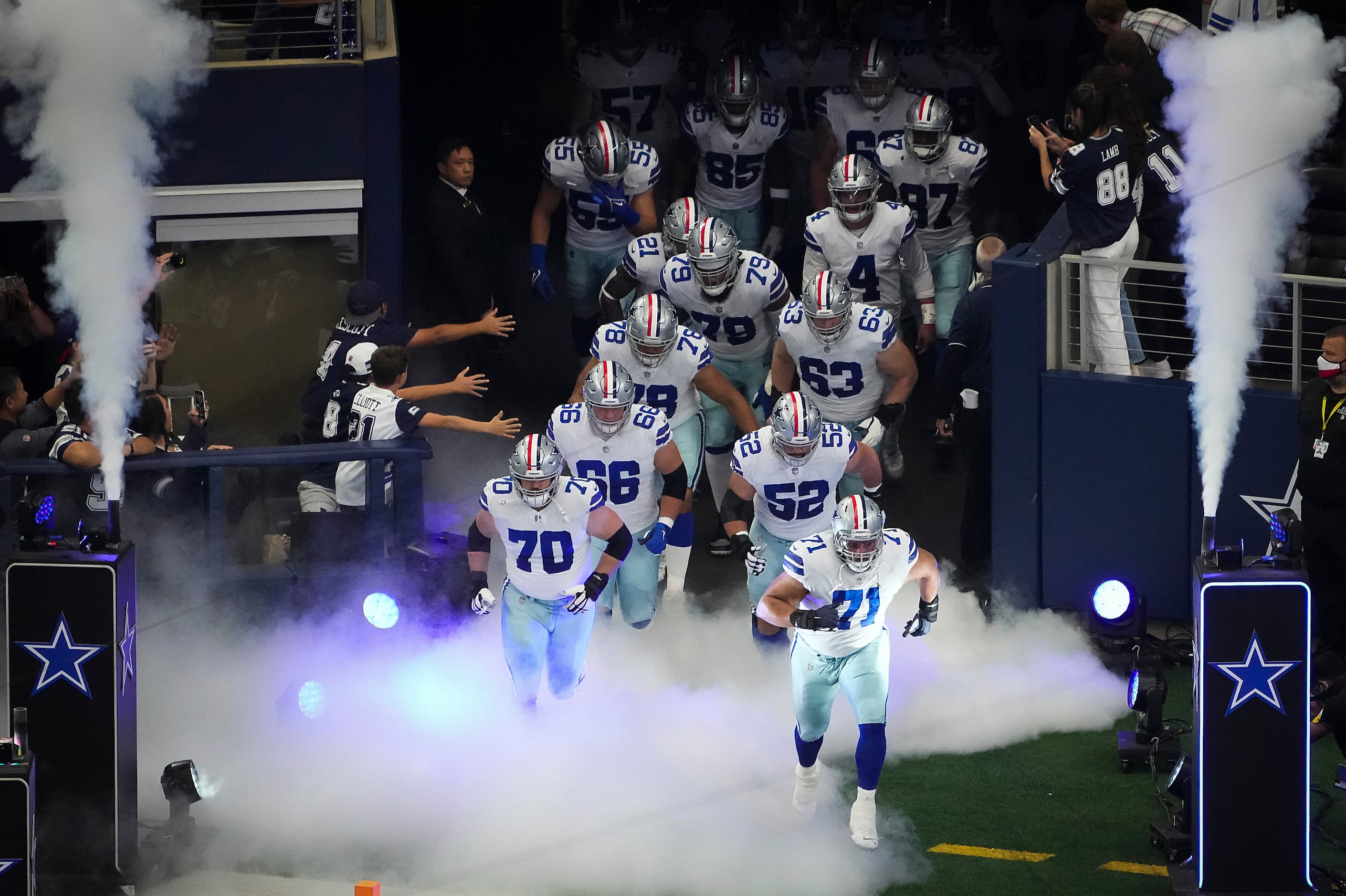 The Dallas Cowboys Cheerleaders, wearing special red striped boots in honor  of NFL Salute to Service, perform during an NFL football game in Arlington,  Texas, Sunday, Nov. 7, 2021. (AP Photo/Ron Jenkins