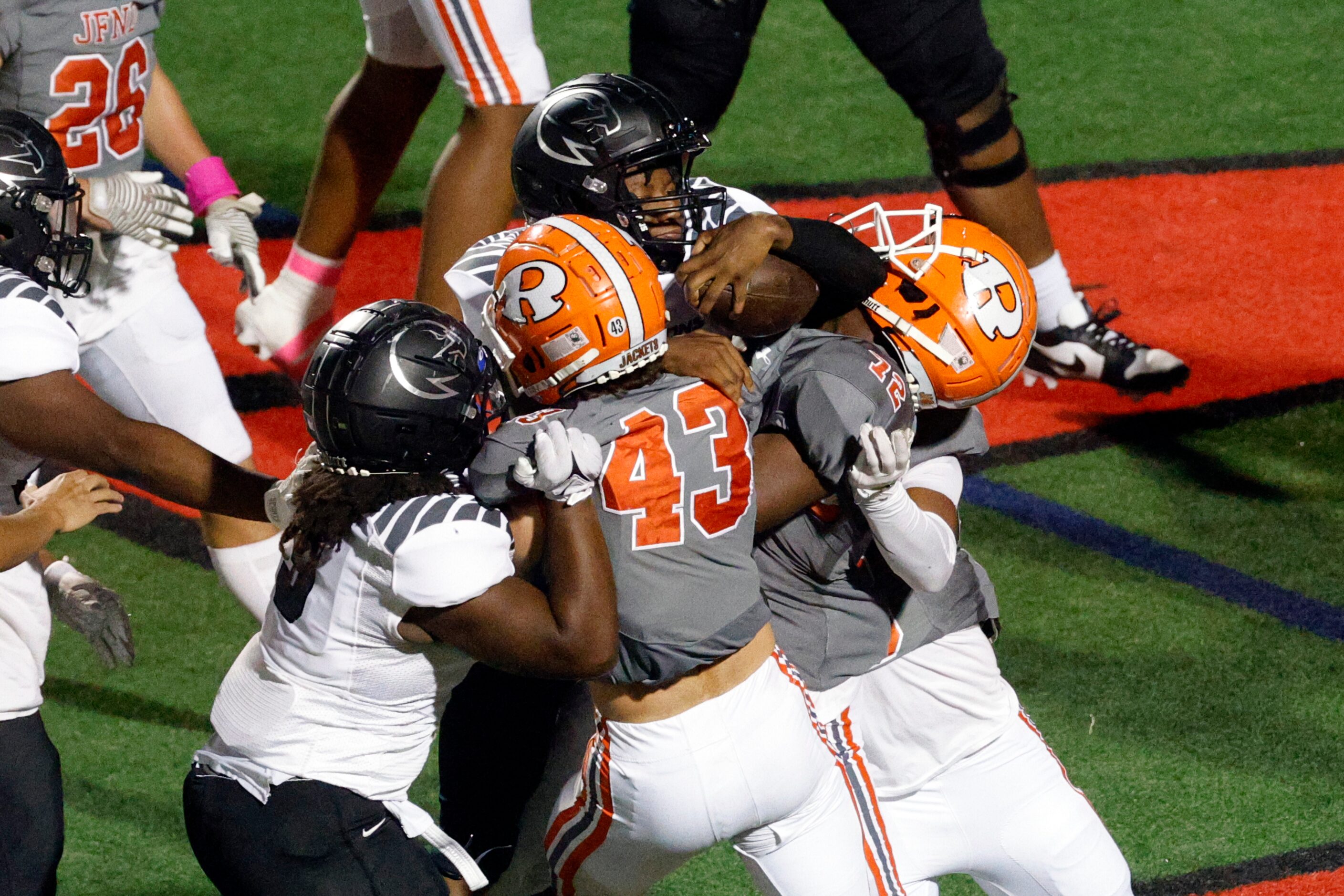 North Forney running back Rozier Burns (23) stretches the ball across the goal line to a...