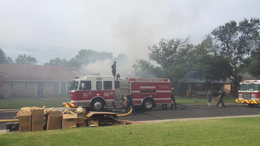  One of two houses on fire Tuesday morning in Northwest Dallas (Photo courtesy Kerrie Smith)