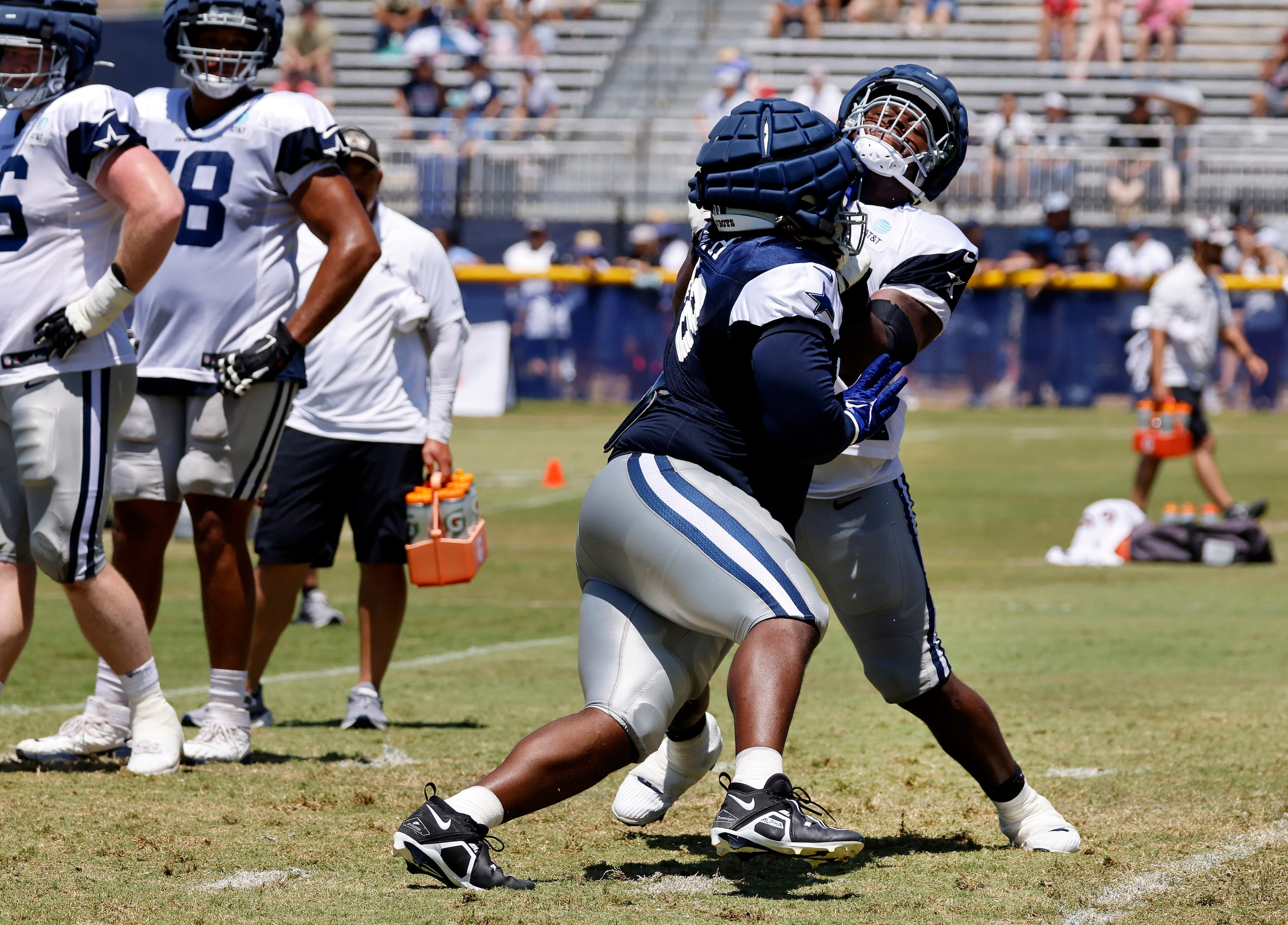 Dallas Cowboys defensive tackle Mazi Smith (58) strong arms offensive tackle Tyler Smith...