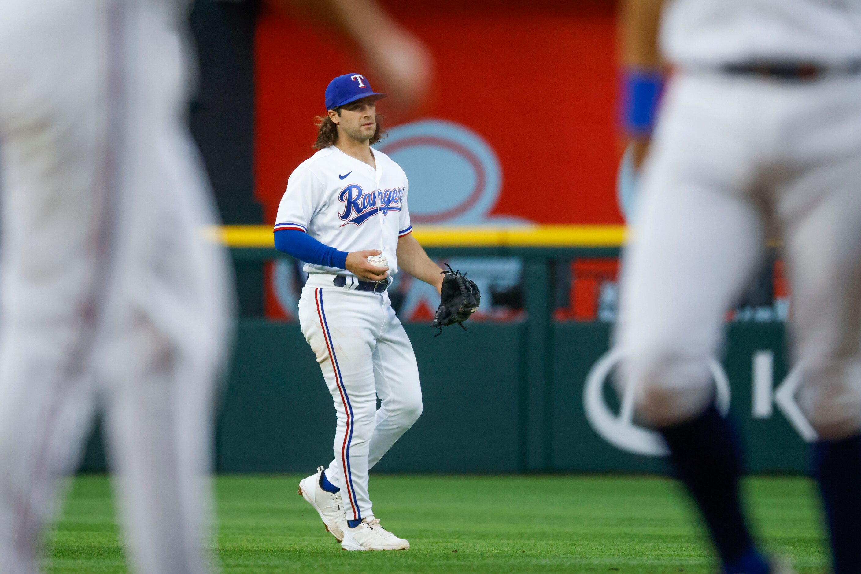 Texas Rangers shortstop Josh Smith fields during the seventh inning of a baseball game...