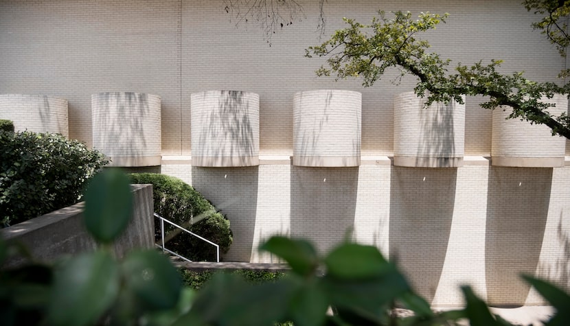 Half-cylinder dressing rooms project from the exterior of Neiman Marcus at NorthPark Center.