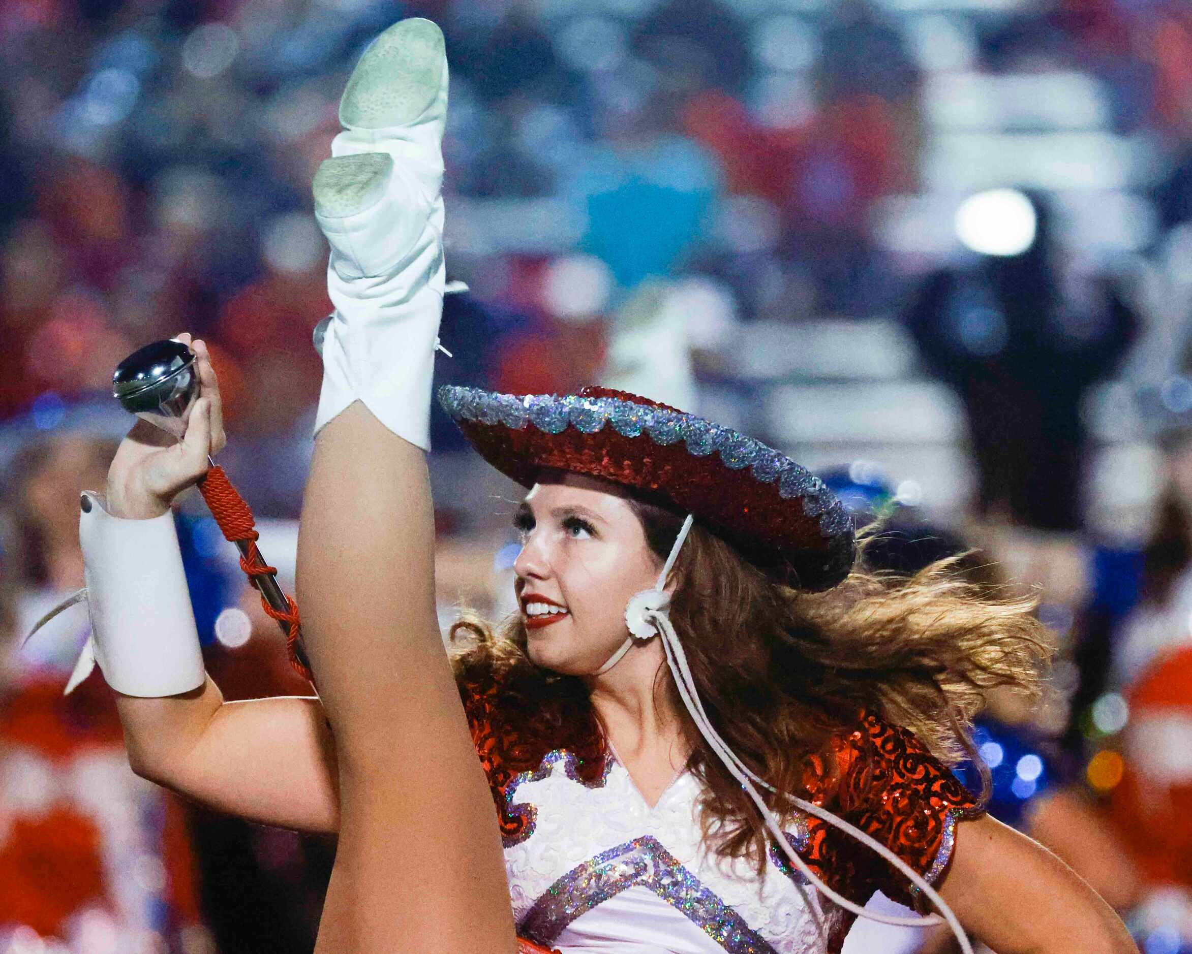 Midlothian Heritage High School Heritage Belles’s Captain Alex Atwell performs during the...