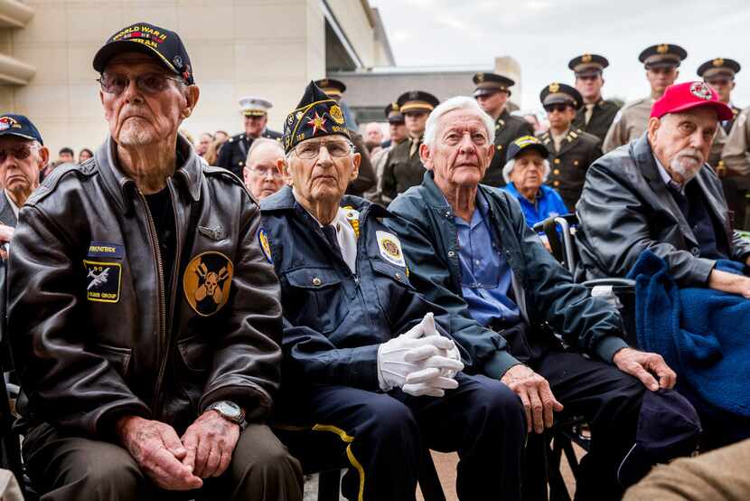 World War II veterans attend a 75th Anniversary of Pearl Harbor commemoration event at the...