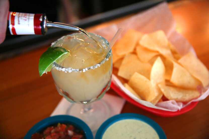 Every meal at Chuy's starts with chips and salsa. Margaritas are optional — but very popular.