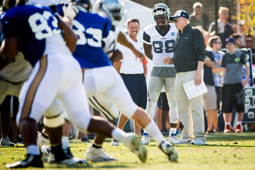 Dallas Cowboys wide receiver Dez Bryant (88) watches practice from the sidelines with team...