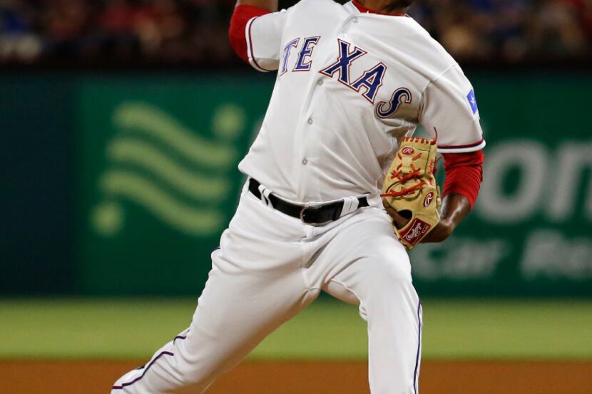 Texas Rangers relief pitcher Jose Leclerc (62) pitches in the seventh inning against the...