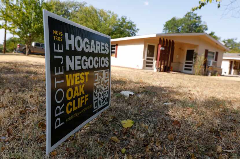 Sign remains outside a house at West Oak Cliff neighborhood on Wednesday, Aug. 3, 2022, in...