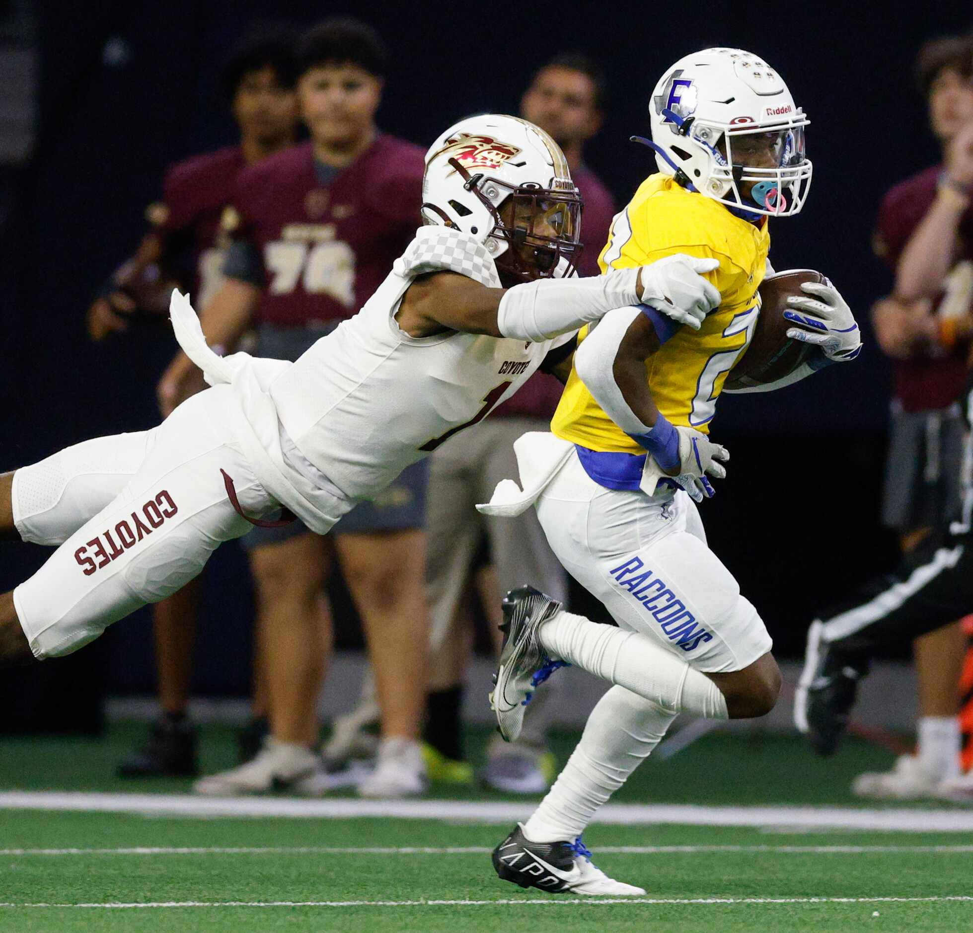 Frisco Heritage defensive back Kameron Franklin (1) tackles Frisco running back Kam...