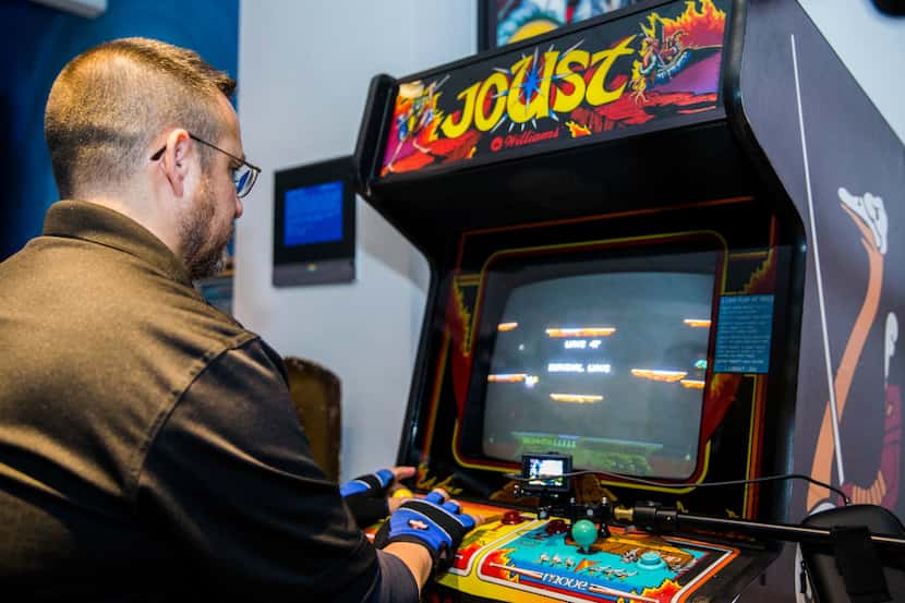 Lonnie McDonald works on a high score on the video game Joust on Wednesday, March 22, 2017...
