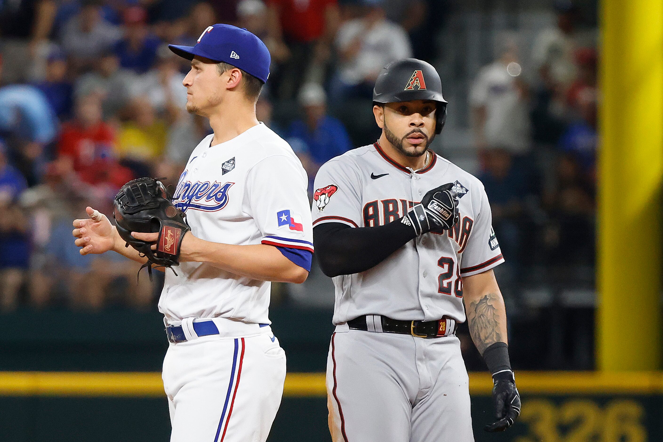 Arizona Diamondbacks designated hitter Tommy Pham (28) celebrates next to Texas Rangers...