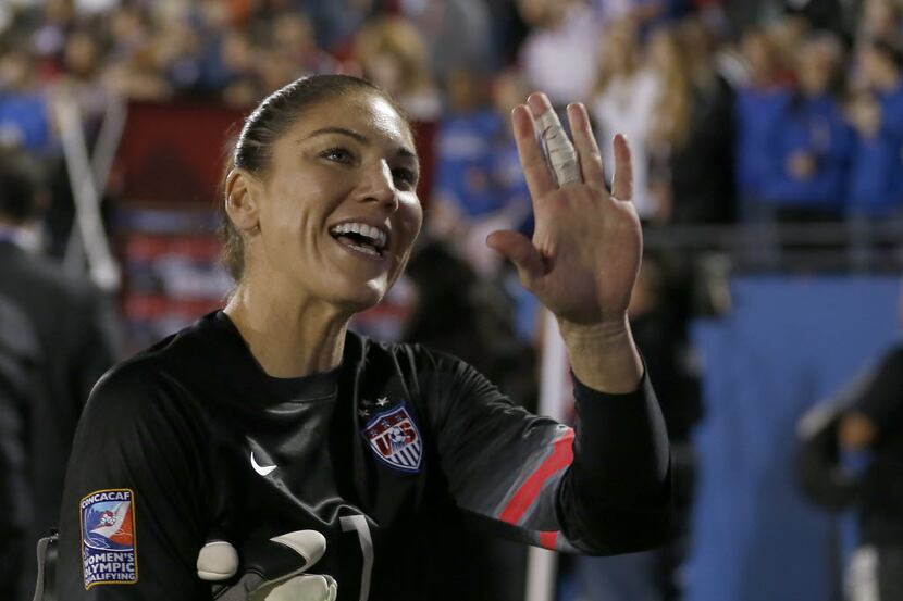 United States goalkeeper Hope Solo (1) waves to the fans after defeating Costa Rica 5-0 in...