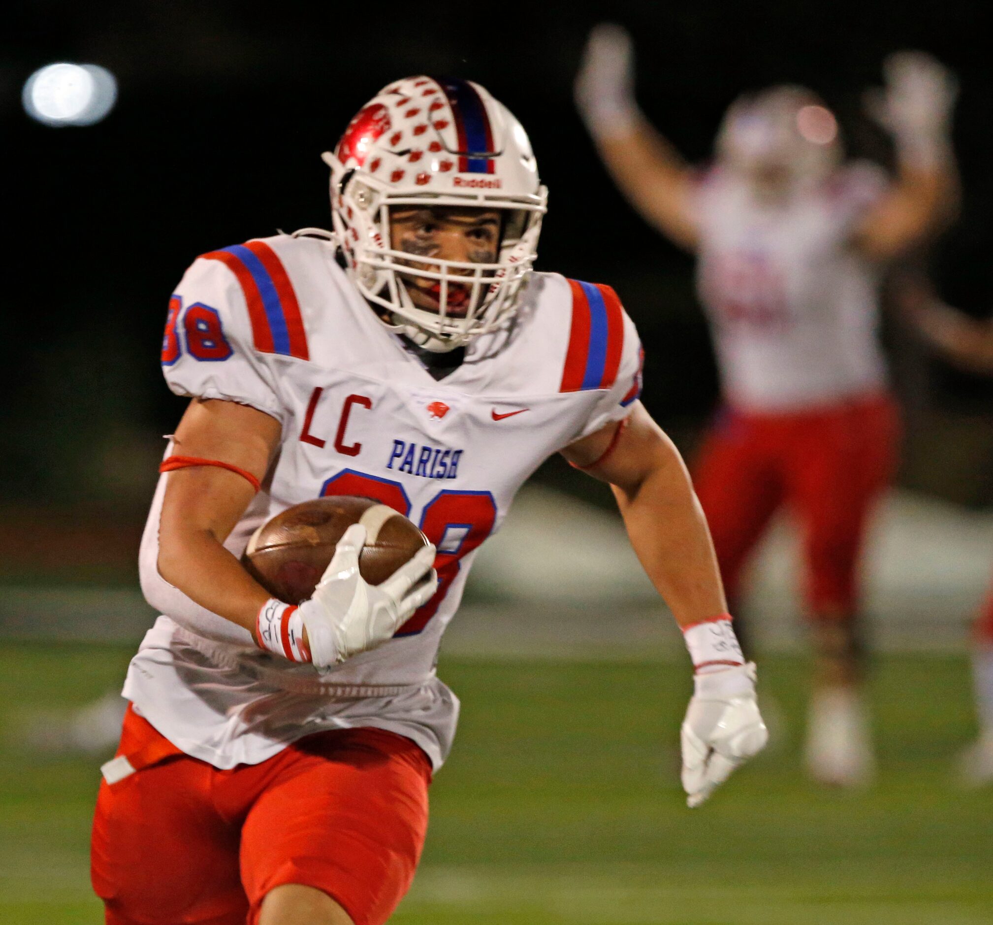 Parish Episcopal receiver Tre Williams (88) takes a reception to the end zone for a...