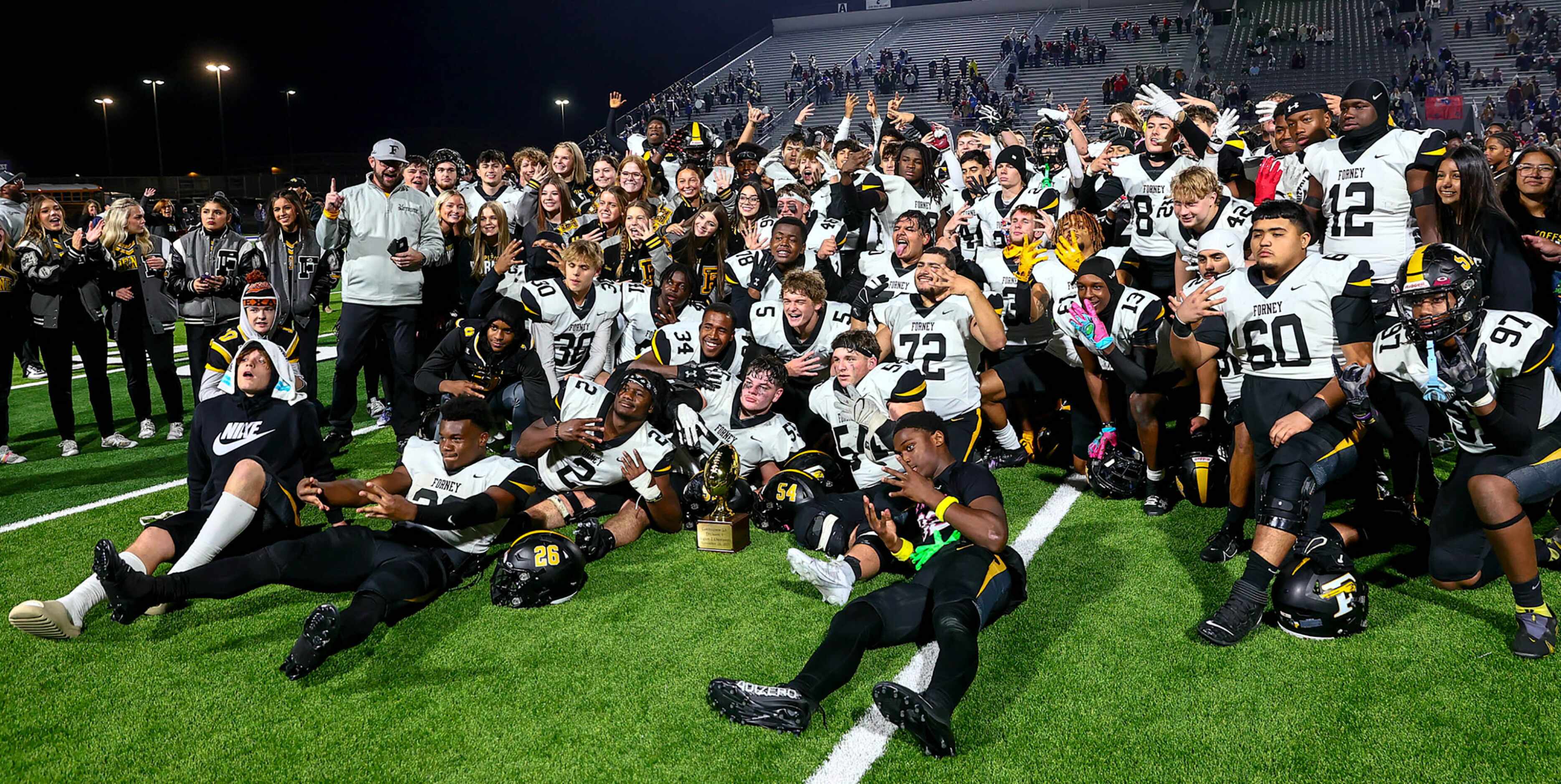 The Forney Jackrabbits celebrate their victory over Richland, 61-40 in the Class 5A Division...