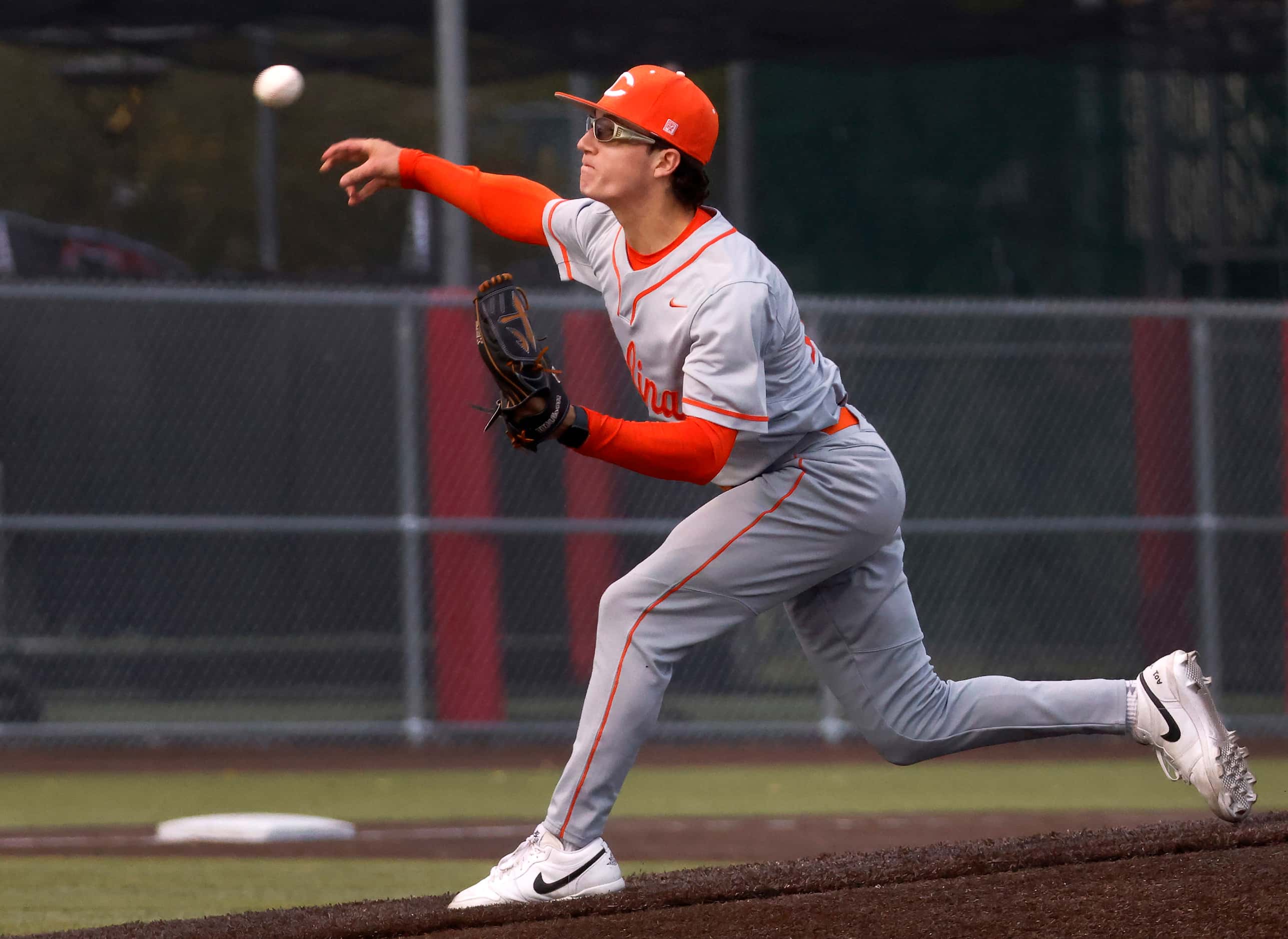 Celina High starting pitcher Brady Broeckel throws in the first inning against...
