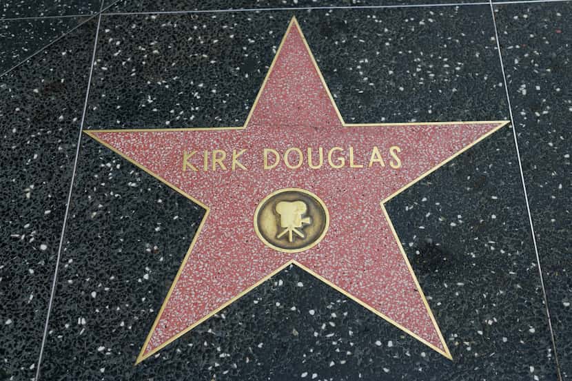 HOLLYWOOD, CA - DECEMBER 06: Kirk Douglas star on the Hollywood Walk of Fame in Hollywood,...