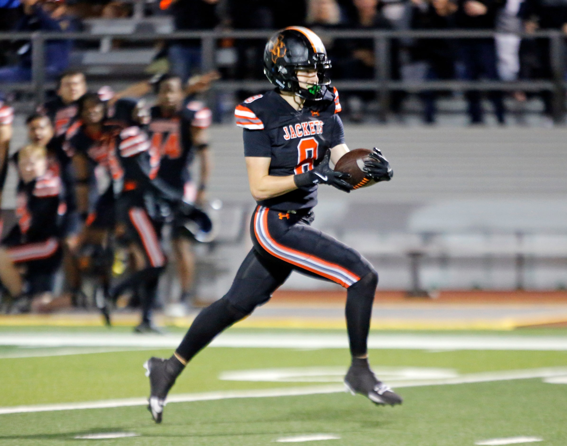 Rockwall High Triston Gooch (8) takes his reception to the end zone for a touchdown during...