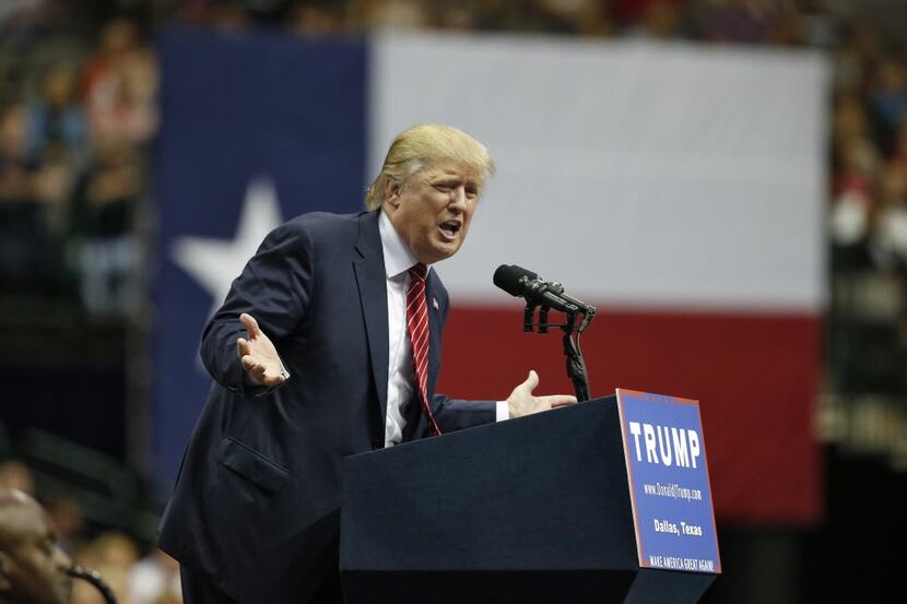 Republican presidential candidate Donald Trump speaks at American Airlines Center in Dallas,...