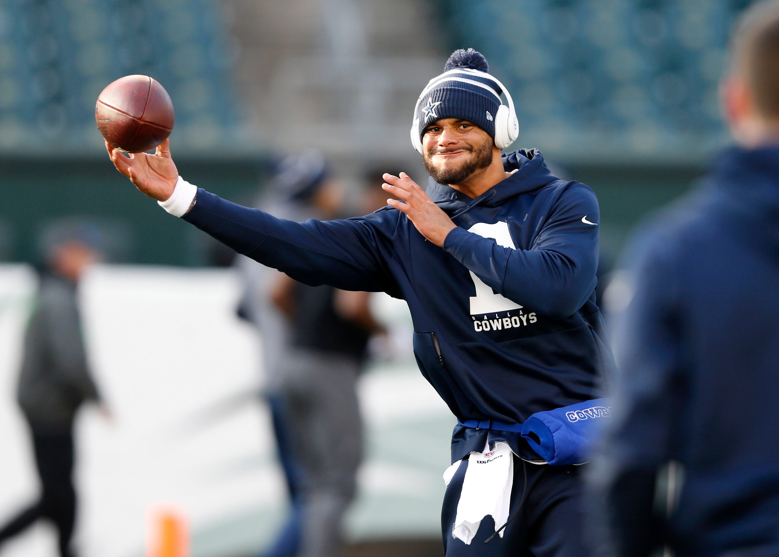 Dallas Cowboys quarterback Dak Prescott (4) throws the ball before warmups prior to a game...