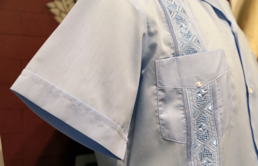 In this Wednesday, Oct. 17, 2012 photo, a guayabera made in Mexico in 2012 featuring machine...