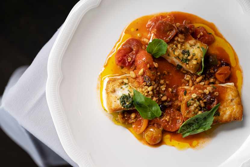 Roasted Halibut with tomato and olive sauce from Chef Eric Dreyer at Monarch restaurant in...