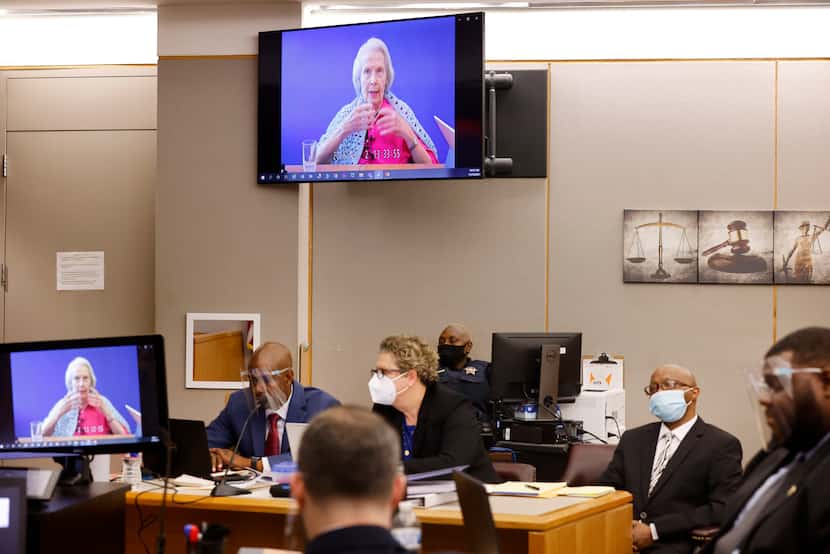 A video deposition by victim Mary Bartel is shown to jurors as she responds to questions...