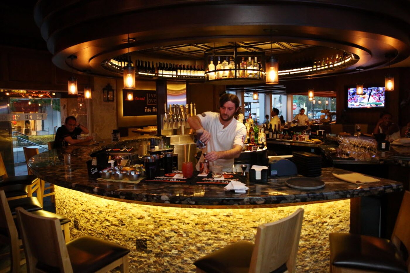 The handsome dining room features a circular bar.