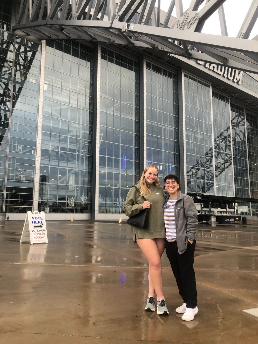 Madelyne Besendorfer (left) and Victoria Sacco (right) post outside AT&T Stadium after...