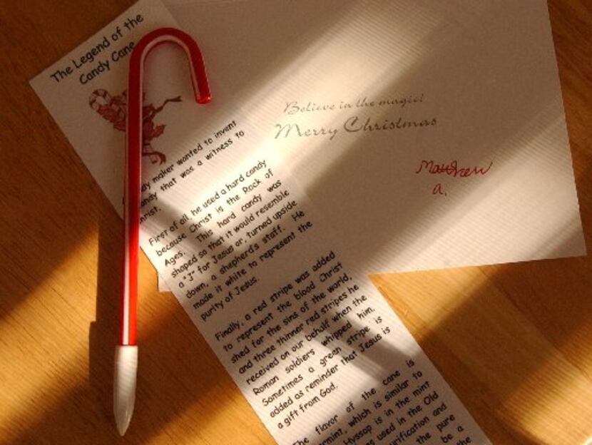 The candy cane pen and long narrow card at left triggered a years-long lawsuit after a Plano...