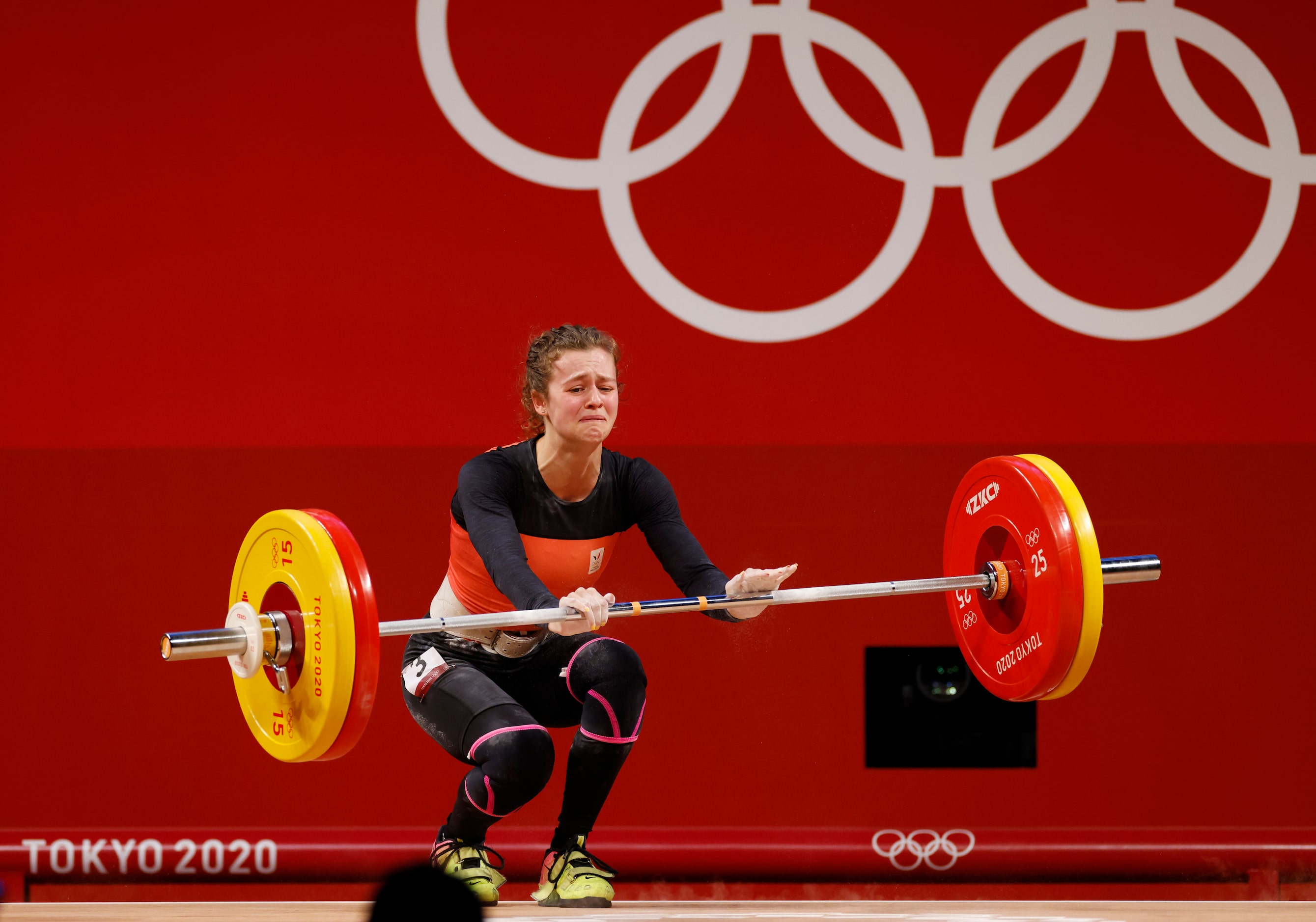 Belgium’s Nina Sterckx dejected after an unsuccessful third attempt in the clean and jerk...