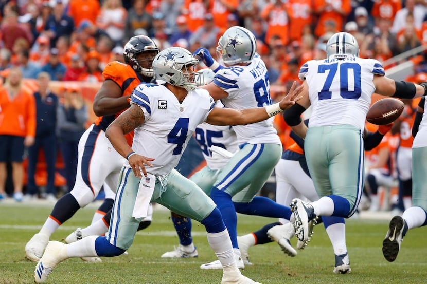 Dallas Cowboys quarterback Dak Prescott (4) passes the ball against the Denver Broncos in...