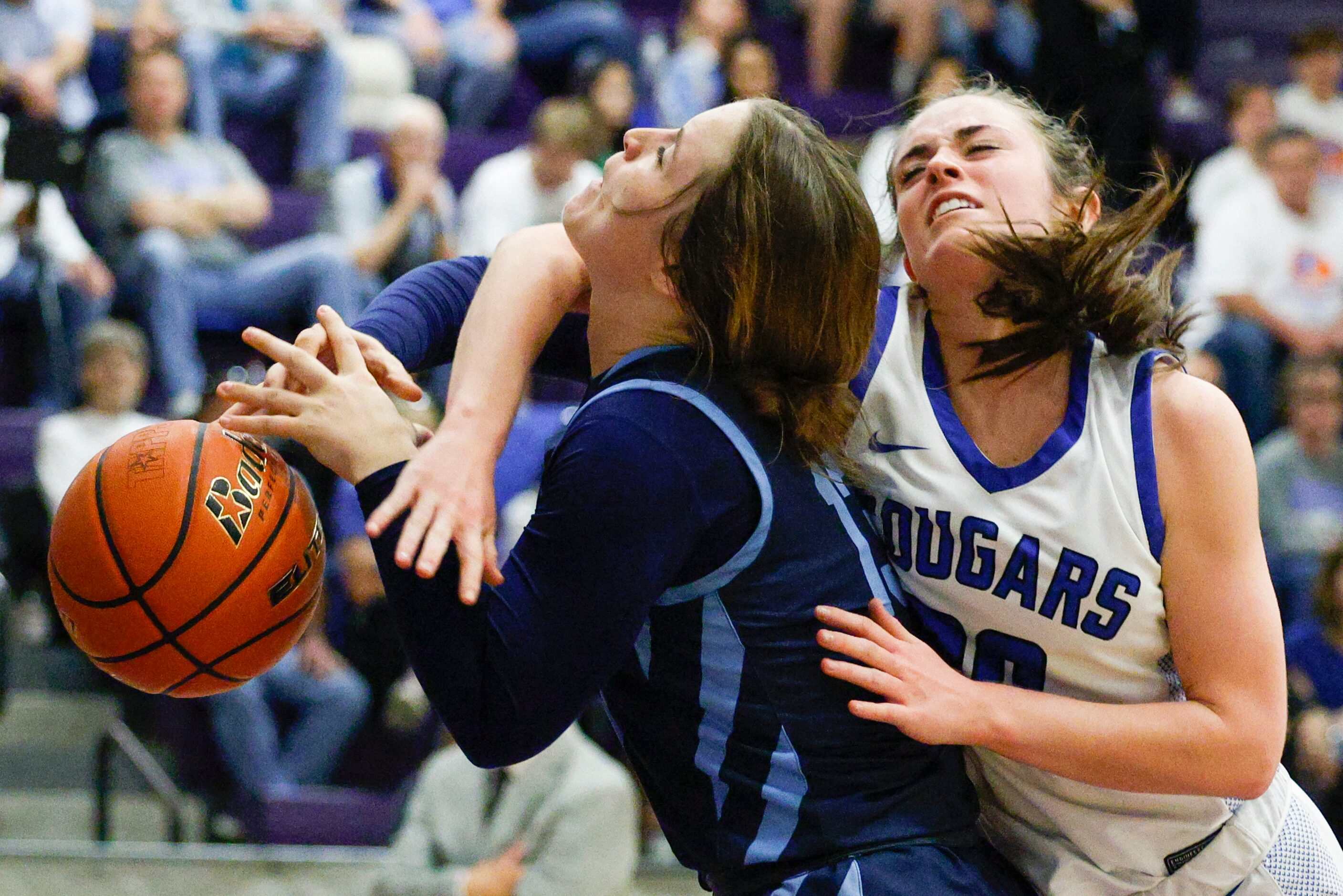 Tyler Grace Community guard Reece Porter (20) fouls Argyle Liberty Christian guard Marisa...