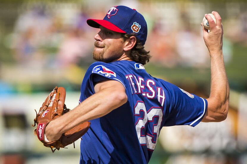Texas Rangers pitcher Nick Tepesch pitches during a spring game against the Kansas City...