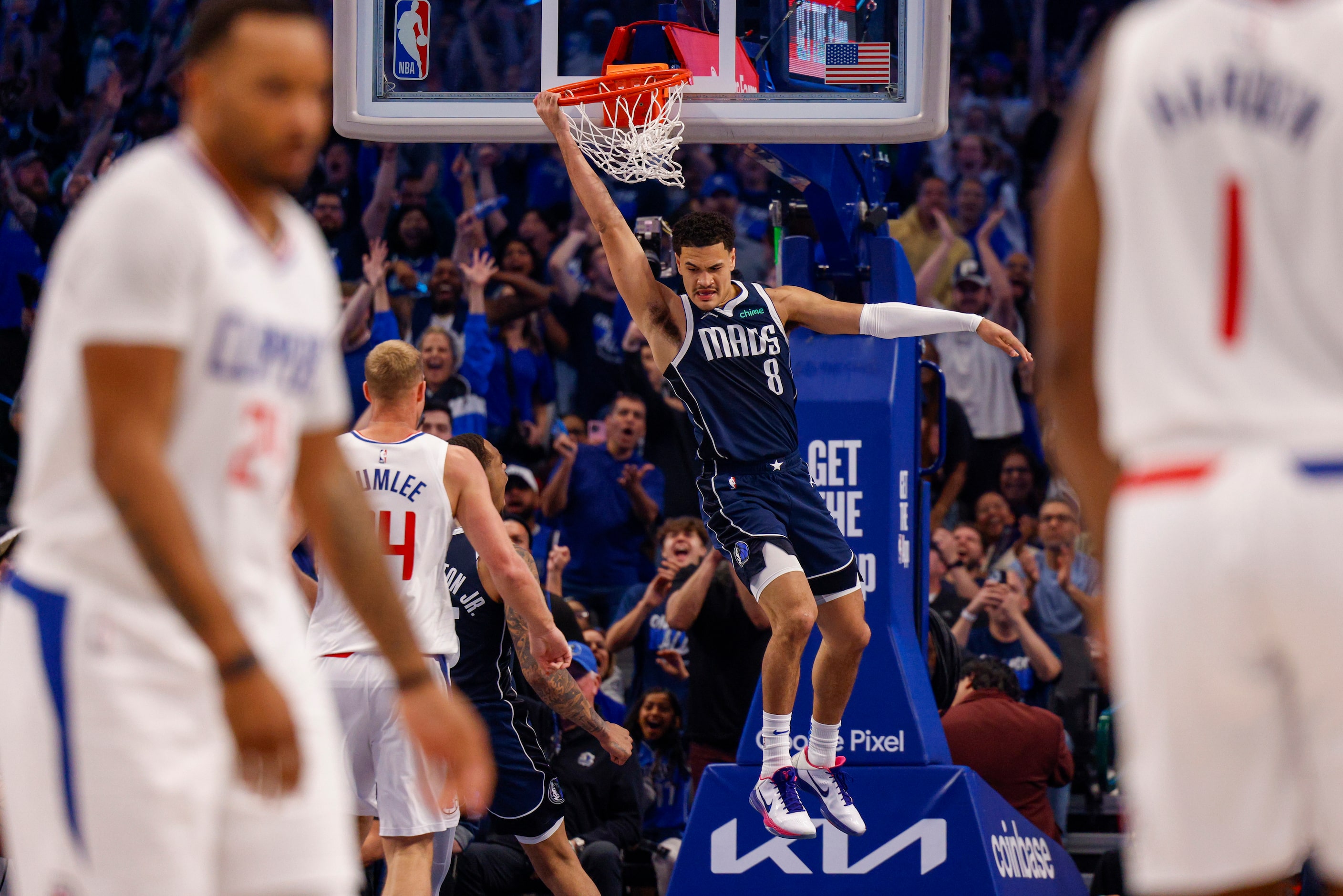 Dallas Mavericks guard Josh Green (8) dunks the ball during the first half of Game 3 of an...