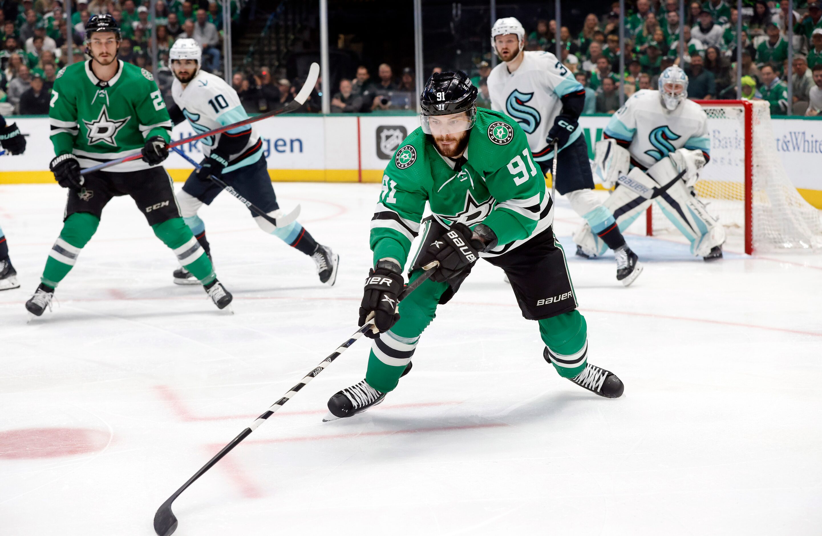 Dallas Stars center Tyler Seguin (91) corrals the puck as he tried to score during the first...