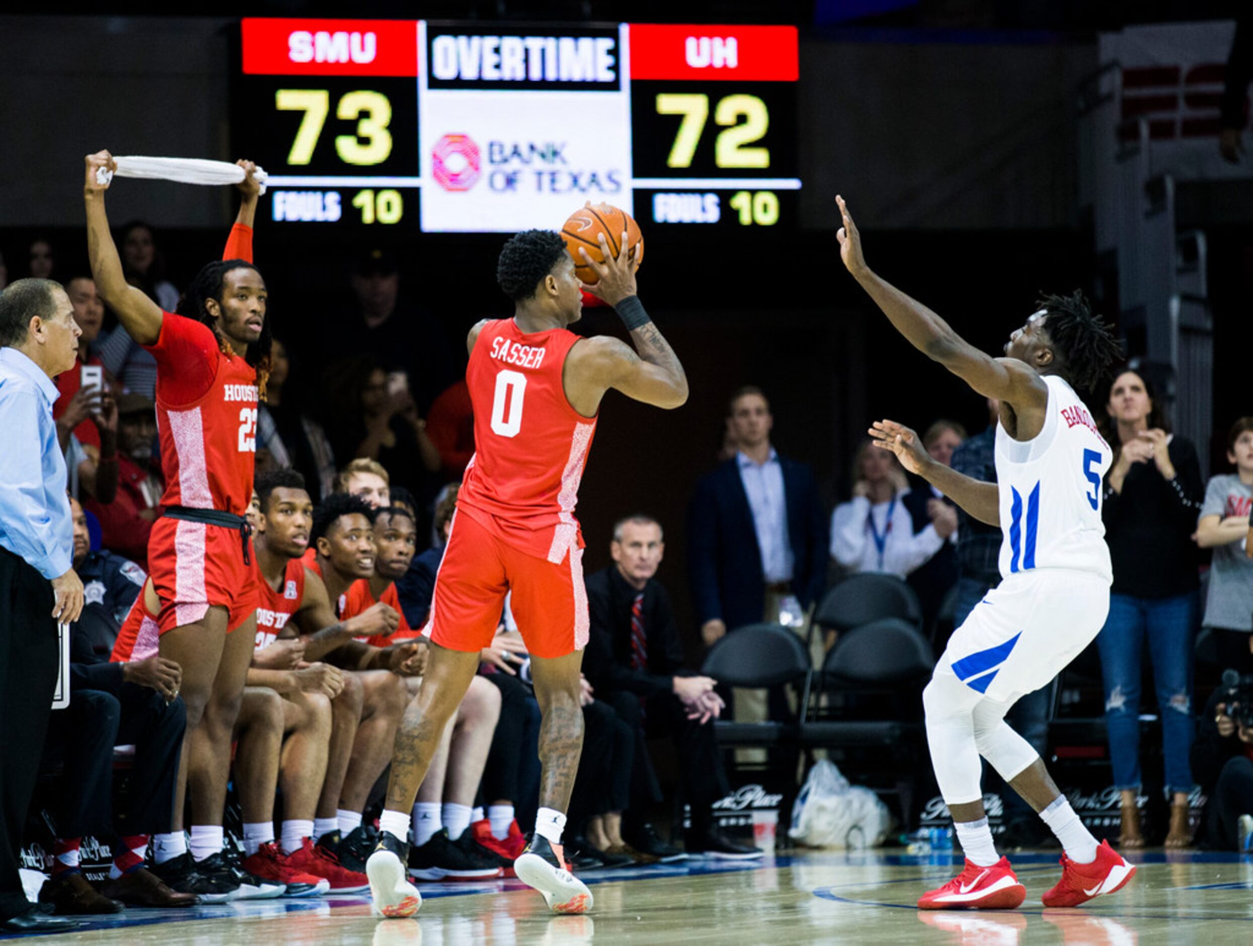 Southern Methodist Mustangs guard Emmanuel Bandoumel (5) defends against Houston Cougars...